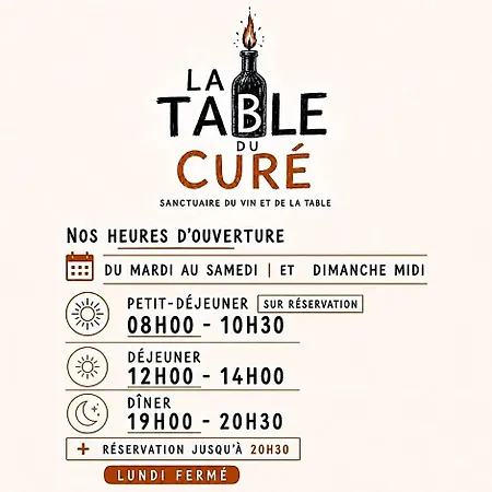 酒店 A La Table Du Cure 屈屈尼昂
